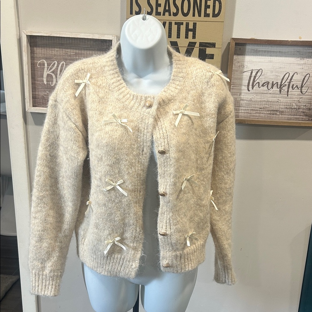 Elegant Cream Cardigan with Bow Details